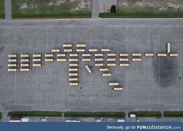 52 yellow school buses lined up to honor the 4,368 children killed by gun violence this
