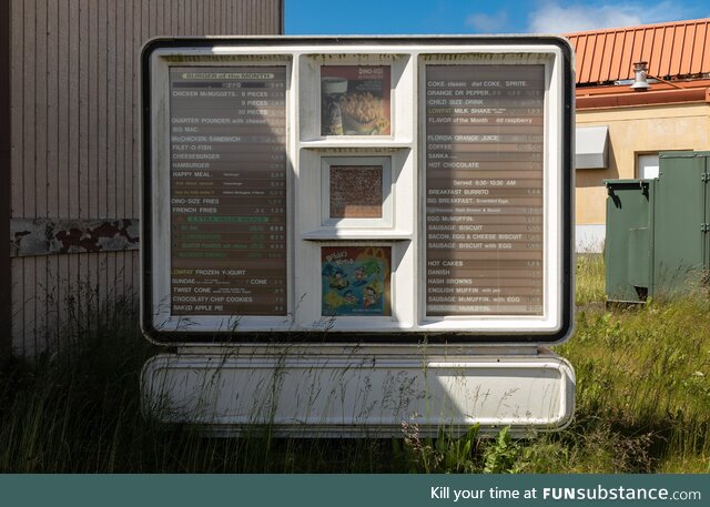This McDonald’s was abandoned in 1993. Drive-thru menu shows Bobby’s World and