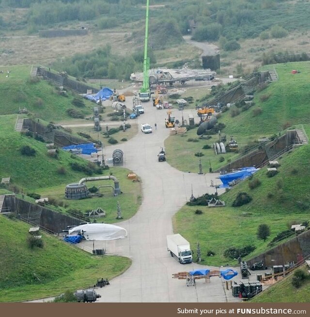 Full scale falcon and x-wing hangers in the English countryside