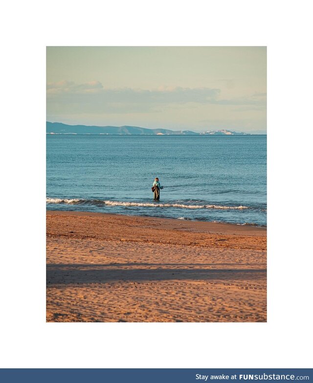 Fishing man on a Spanish beach