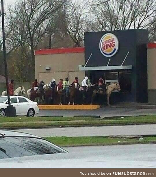 Knights lining up to receive their meal from the king