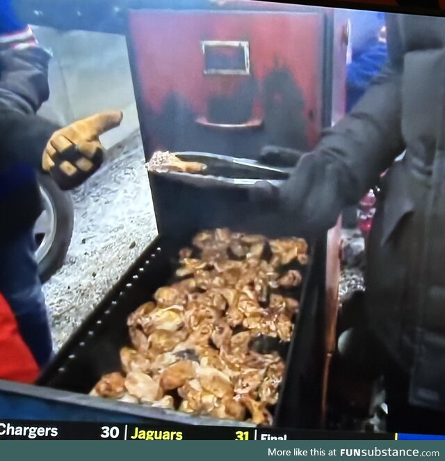 Watching Bills fans cooking meat… in a filing cabinet