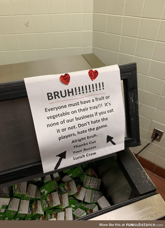 This sign by the cafeteria staff trying to appeal to gen z and get us to eat fruit or