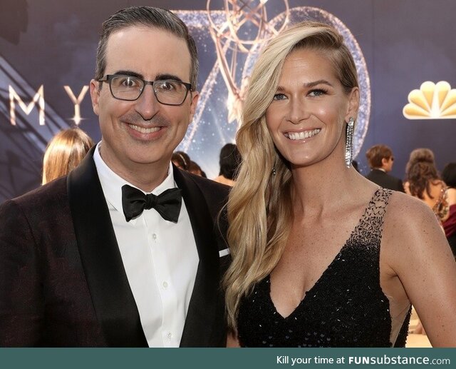 John Oliver next to someone who REALLY LOVES comedy