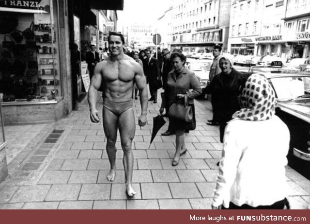 Arnold Schwarzenegger walking through Munich to promote his gym (1967)