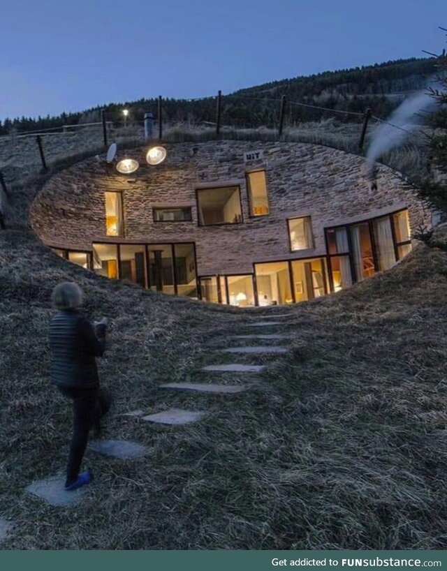 This interesting home built into a hill