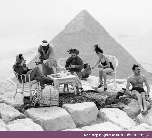 A group of tourists on top of the Great Pyramid (Pyramid of Khufu), Giza, Egypt in 1938