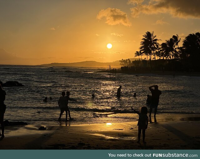 People enjoying the Sunset at Poipu Beach, Kauai Hawaii tonight