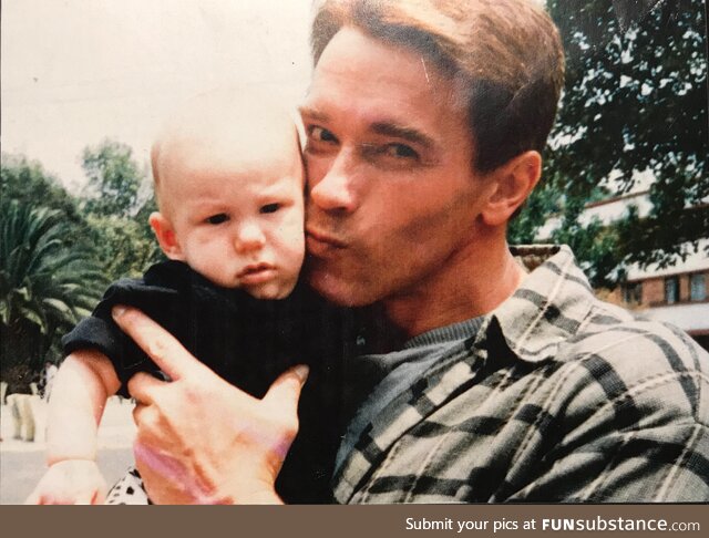 [OC] Here’s Arnold Schwarzenegger kissing me as a baby. I post it every year for his