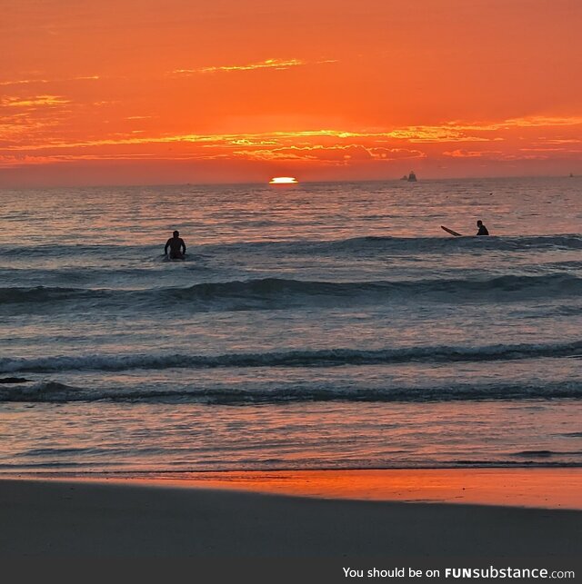 Surfers at Sunset, Ocean Beach CA US