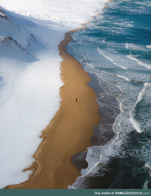 A beach in Japan where snow, sand and sea meet each other
