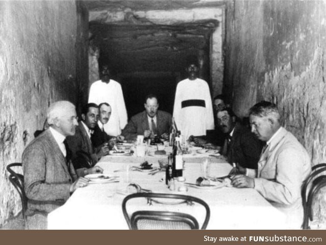 Archeologists dining inside the tomb of Pharaoh Ramses XI in 1923