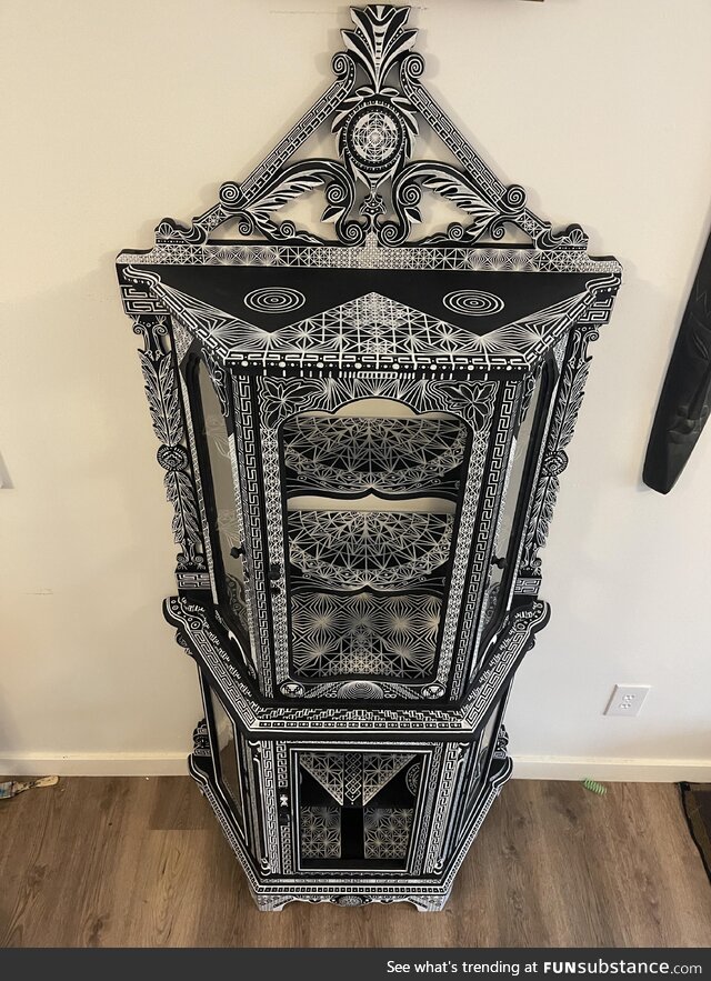 I’m working on hand painting this cabinet I got at the thrift store