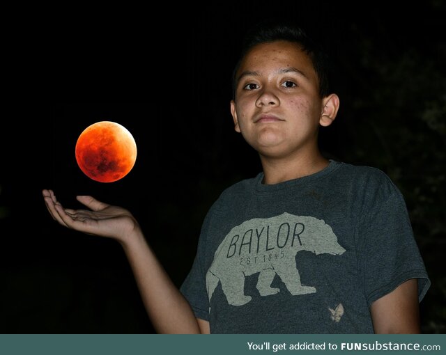 (OC) my brother's teacher told the class to take a picture with the lunar eclipse for