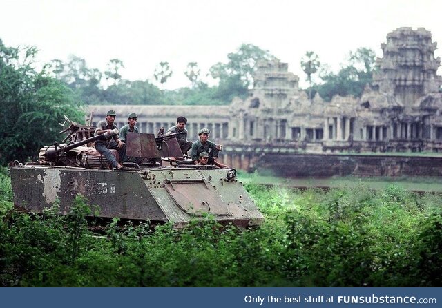 Vietnamese M113 crew resting infront of Angkor Watt, Vietnam & Cambodia against the