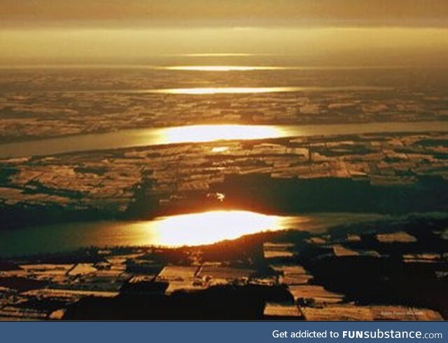 I saw this photo and had to share. The sun reflected off 5 of the 11 Finger Lakes in New