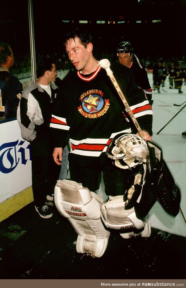 John Wick playing hockey in 1997
