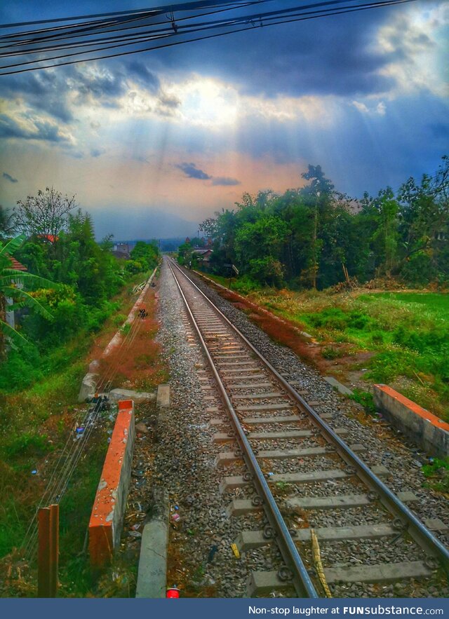 Shot while crossing railway tracks in Indonesia