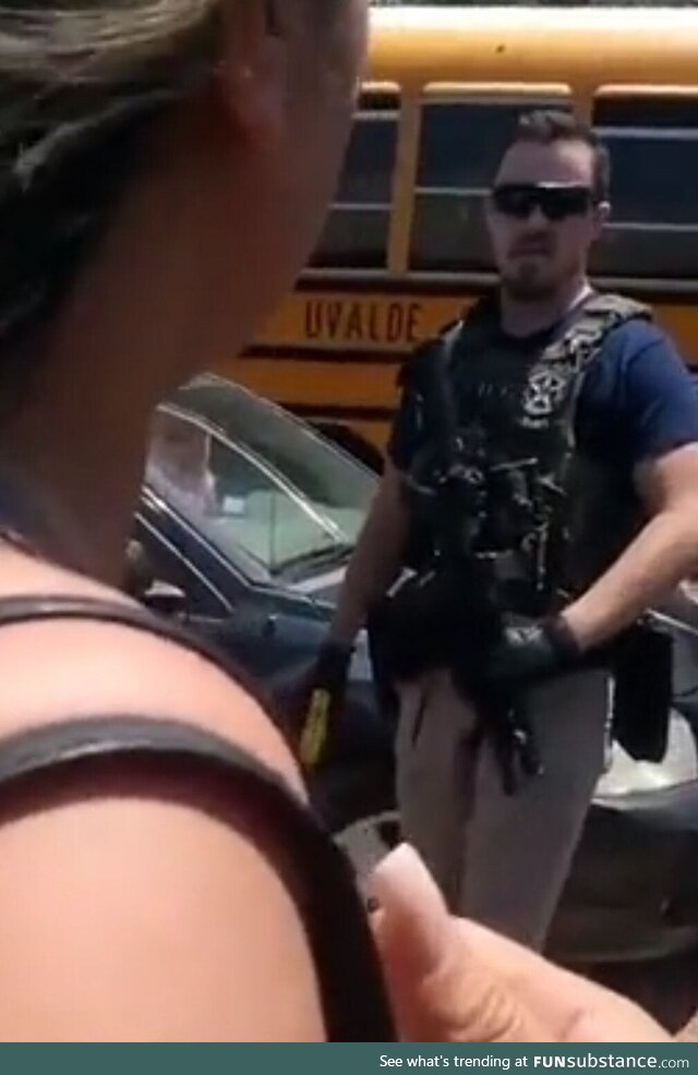 [OC] Cop w/assault rifle ready to tase parents but won't help children in a school