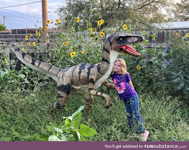 My daughter with my moms velociraptor