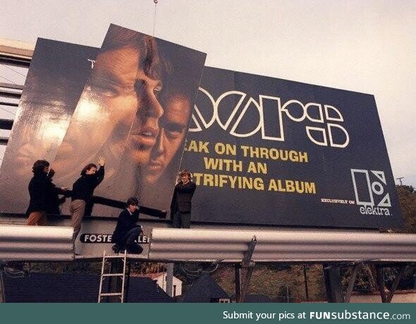 The Doors help set up their Sunset Strip billboard promoting their debut album in 1967