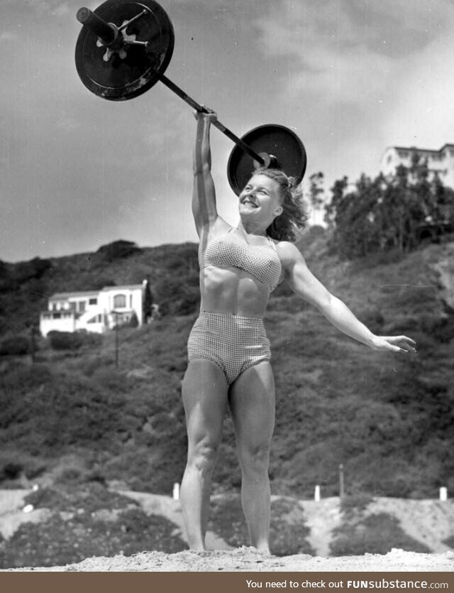 Abby Stockton Playing with a weight in California Beach 1940s