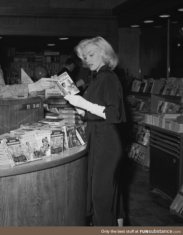 Marilyn Monroe at a bookstore on Sunset Boulevard, Beverly Hills, 1953. Photo by Andre de