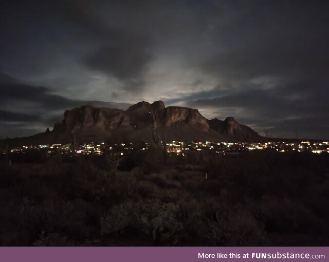 Superstition Mountain in Arizona. Those lights are climbers. (OC)