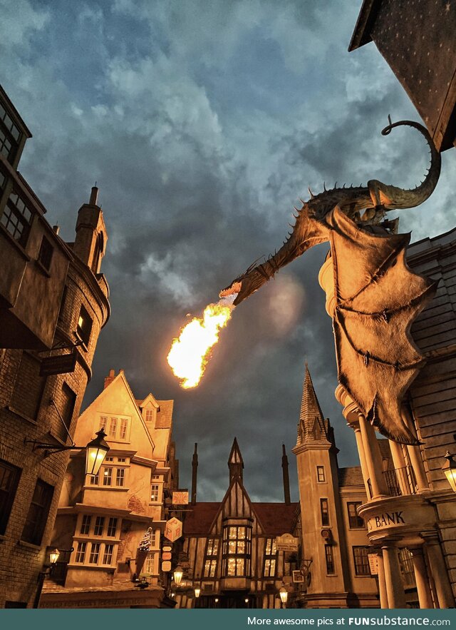 Took this picture of the dragon sitting atop Gringotts Bank in Diagon Alley