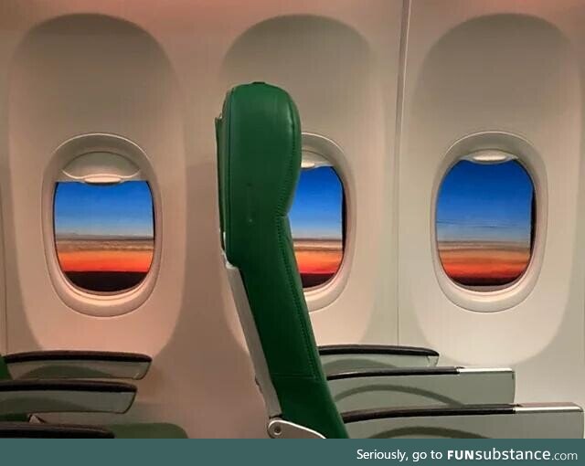 Sunset inside an almost empty plane