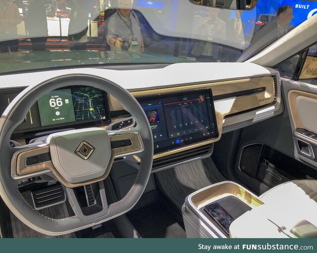 The inside of the Rivian electric SUV reminds me of the white power ranger