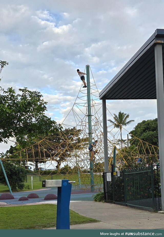 A Dad at the playground living his best