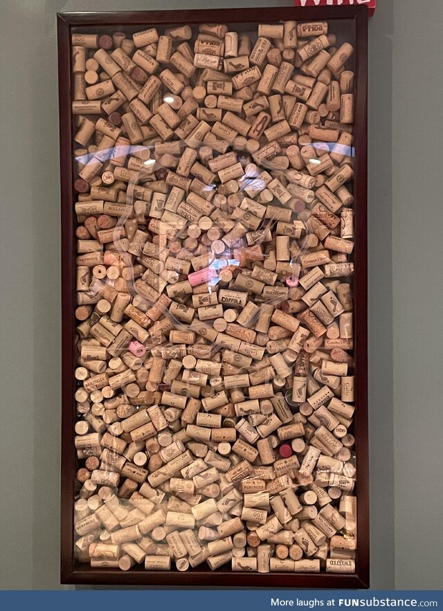 How many wine corks are in this 18”x 36” x 2” cork holder? My family bet money