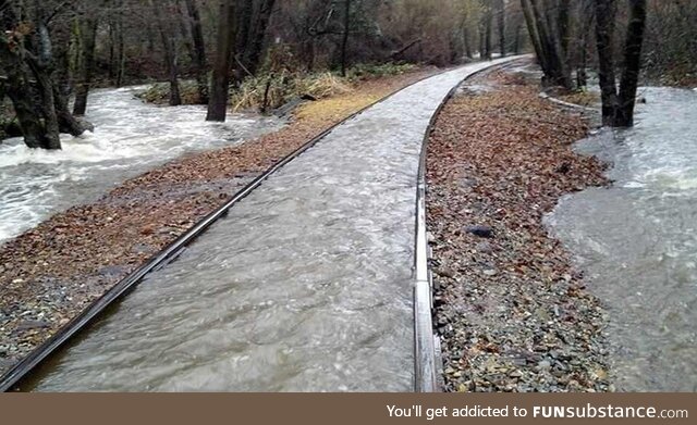 Train rails preventing water from escaping