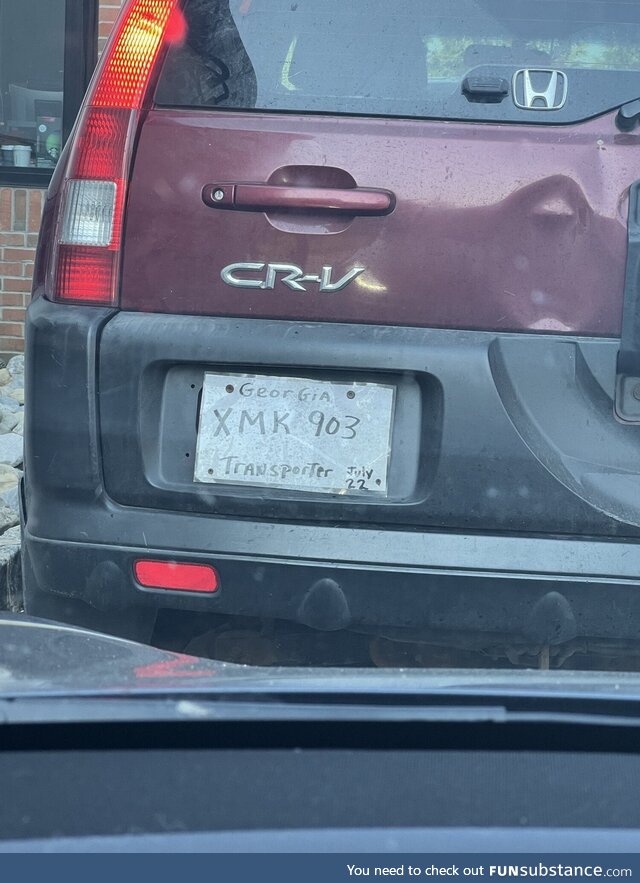 This dude literally wrote a plate number on a piece of paper, laminated it and put it on