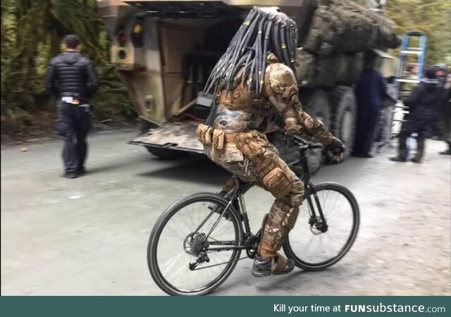 Predator riding a bicycle