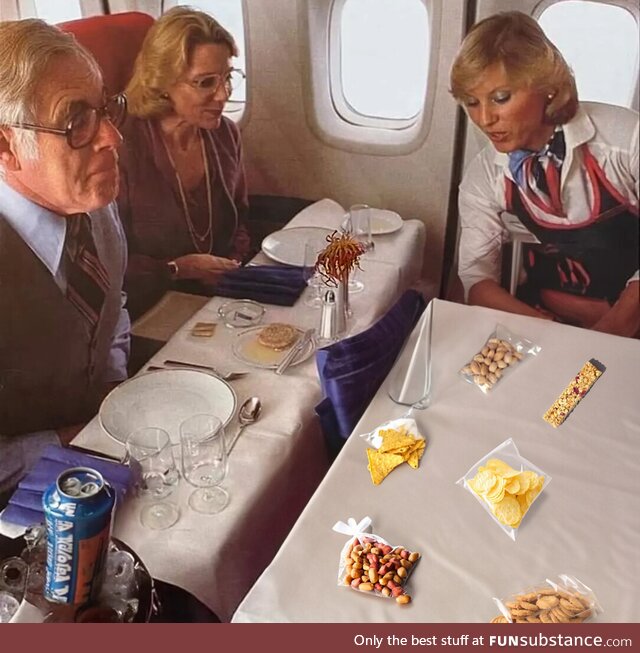 United Airlines flight attendant presents current First Class food offerings on a