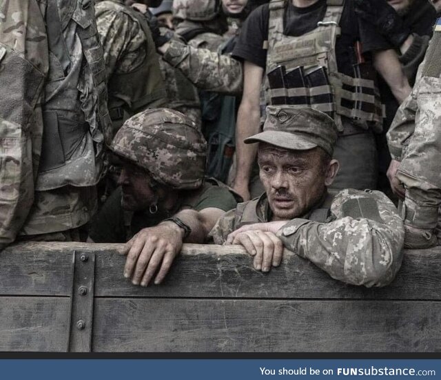 Exhausted, tired but unbroken. Ukrainian troops. Beautiful photograph