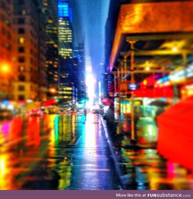 Rainy nights in NYC. Times Square got me in a trance