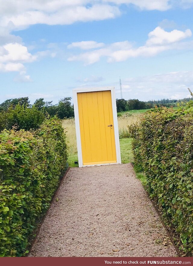 A doorway to a field