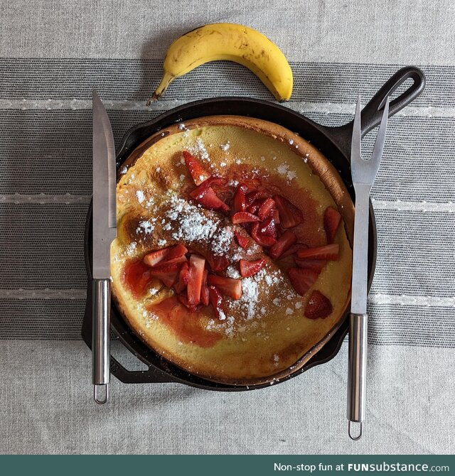 This dutch baby my wife made me for breakfast (banana for scale)