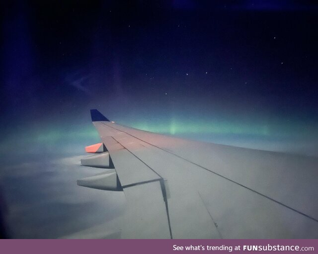 Northern lights illuminated my flight home from Detroit to Amsterdam on 09/03/2023