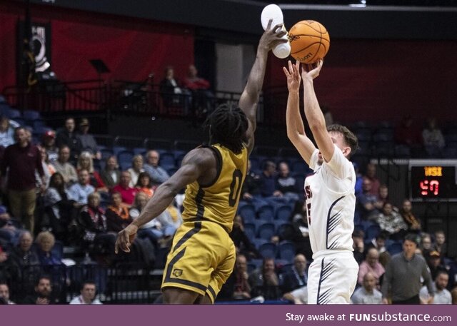 Purdue Fort Wayne’s Rasheed Bello lost his shoe, picked it up, & blocked a shot with it