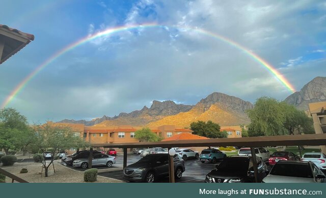 I took this picture of a rainbow outside my place.  Trump is not in it