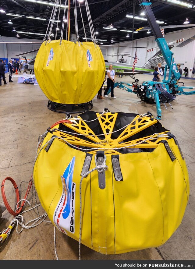 Helicopter water buckets for wild fires up close