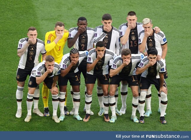 German football team covers their mouths at their first game in Qatar