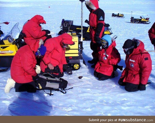 My research team finding a meteorite in Antarctica