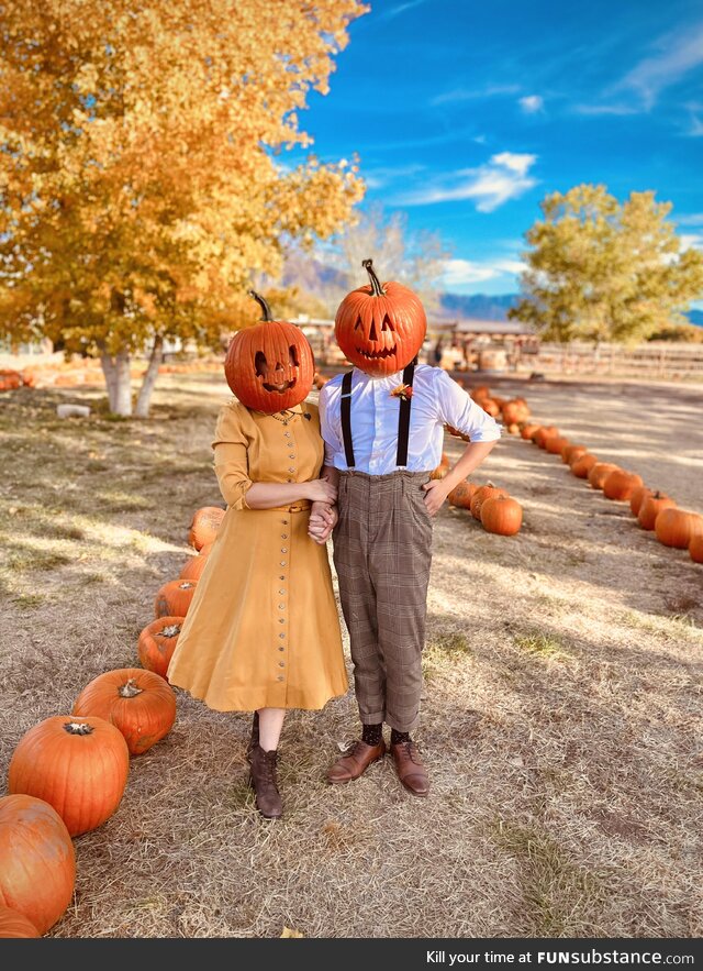 My boyfriend and I as pumpkin people at the pumpkin patch!