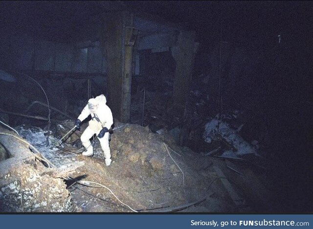 A lone scientist descending into the radioactive darkness of Chernobyl in 1986