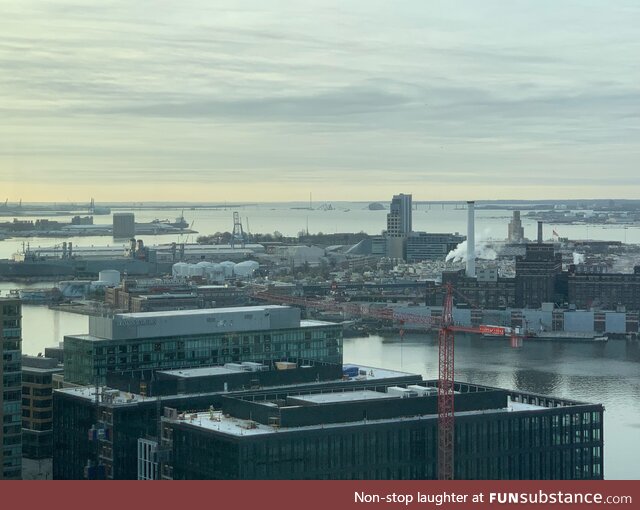 Distant view of Baltimore bridge collapse as seen from office building in Harbor East